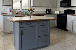 Custom kitchen island in Sherwin-Williams midnight gray with shaker panels real life customer project by Vincent