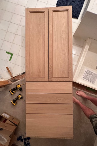 Custom built-ins recessed wall niche with white oak drawer fronts