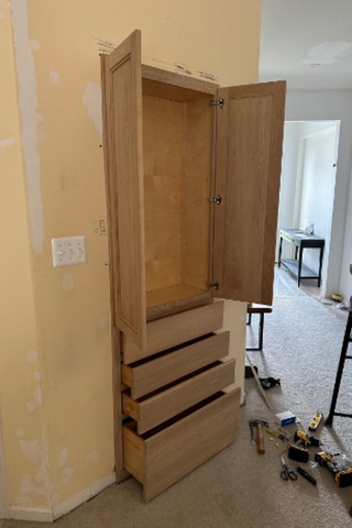 Custom built-ins niche wall command center with organized drawers