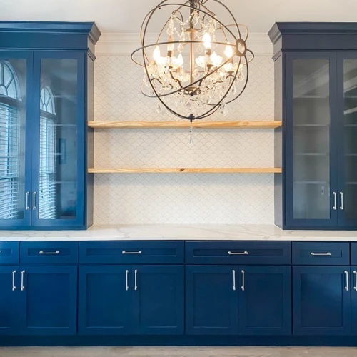 Ruby S's unfinished shaker cabinet doors open for glass second view