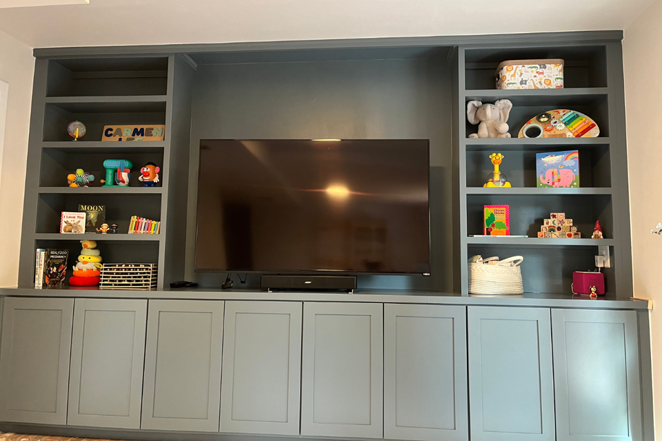 Custom built-in cabinetry with shaker cabinet doors creating a clean built-in look in Charles’ real life project