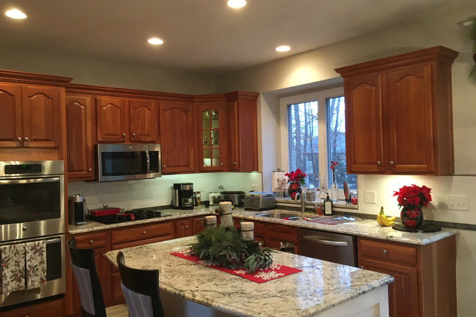 Before photo of Ferowich kitchen before custom kitchen cabinets upgrade with Revere doors and glass panels