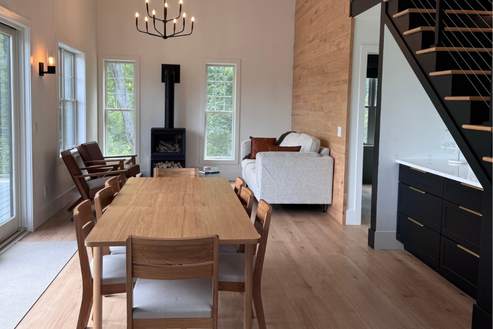 Custom built-in cabinets and storage wall detail from Mary Jo’s modern black kitchen real life project