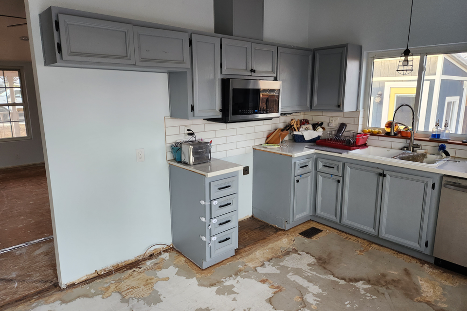 Before photo of Paul kitchen prior to custom kitchen cabinets update with two tone cabinetry