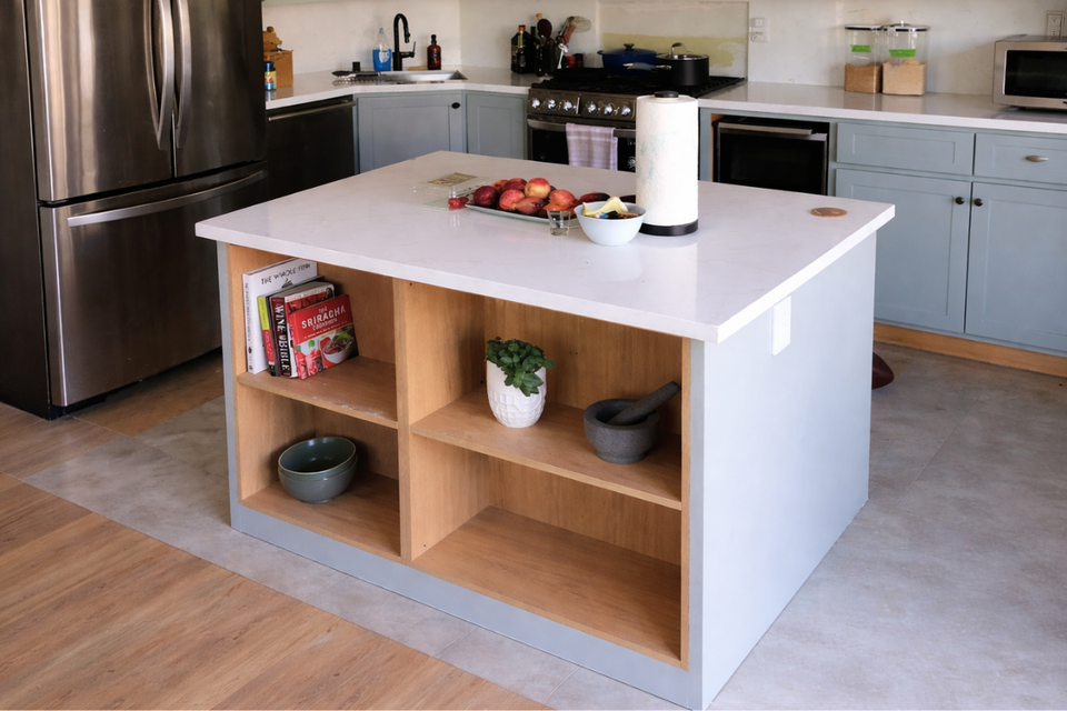 Custom kitchen cabinets with sage green shaker thermofoil and white countertops in Stephen project