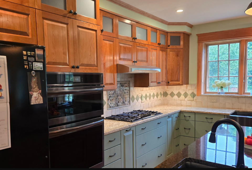 Clear coat cherry wood cabinet doors in custom kitchen remodel