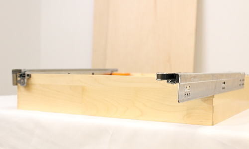 Prefinished birch drawer box &mdash; crisp edges and clear-coated interior