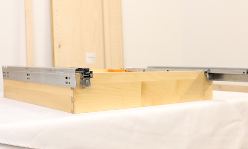 Walnut dovetail drawer box &mdash; furniture-grade grain and finish