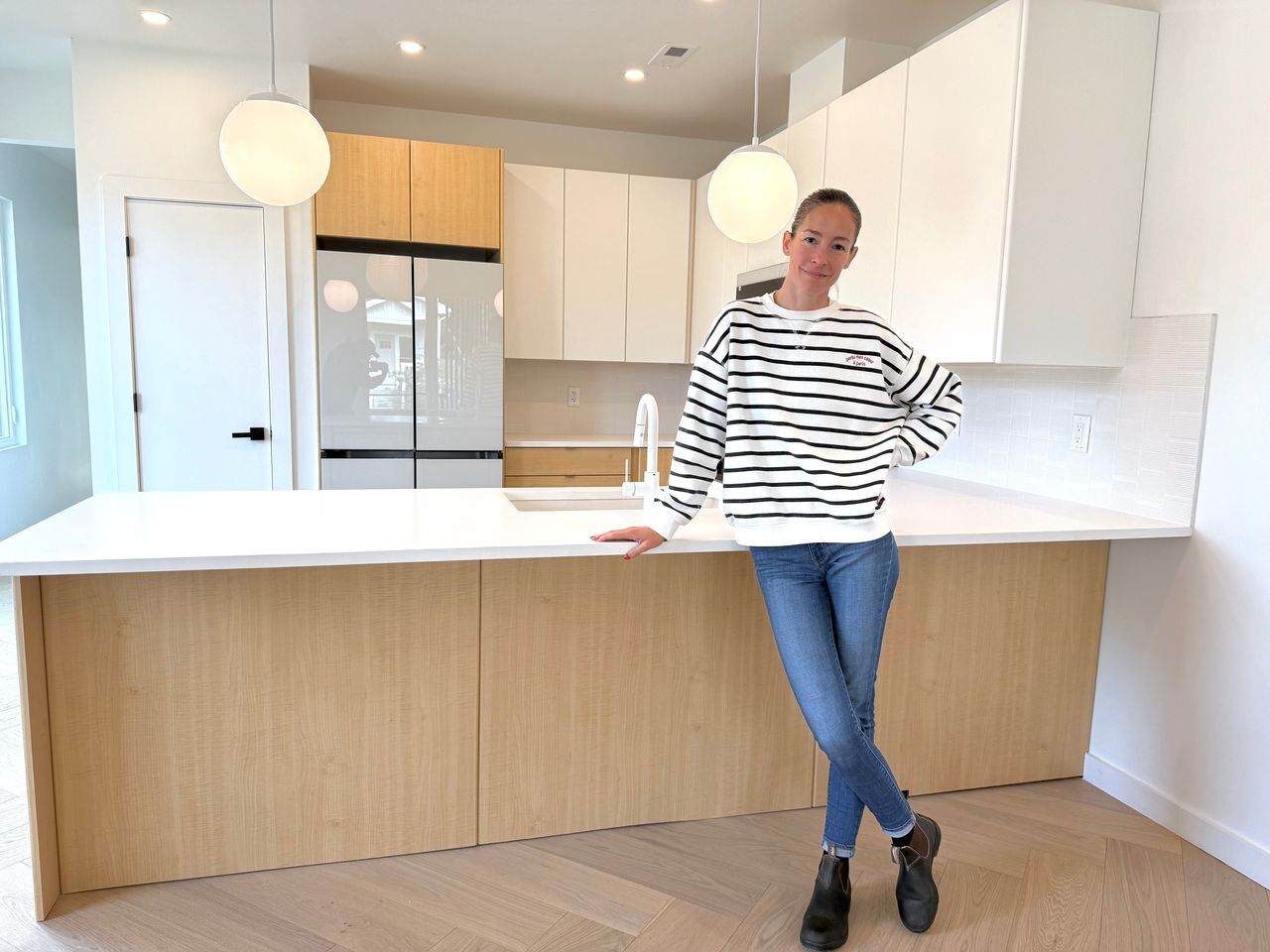 Two-tone modern frameless cabinetry by Kata Walters, Hinuera Properties