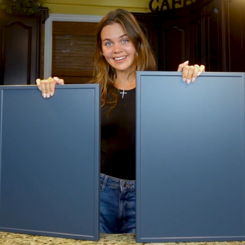 Customer showcasing Shaker Slim cabinet doors in Midnight SuperMatte thermofoil finish