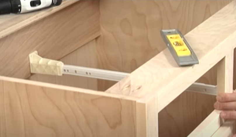Step 3: Attach the drawer glides to cabinet box