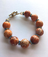  28 Count 14mm Fire Agate Polished Rounds 