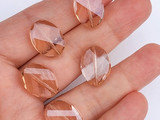 13x18mm Peach Glass Crystal Twisted Ovals, 5 Count