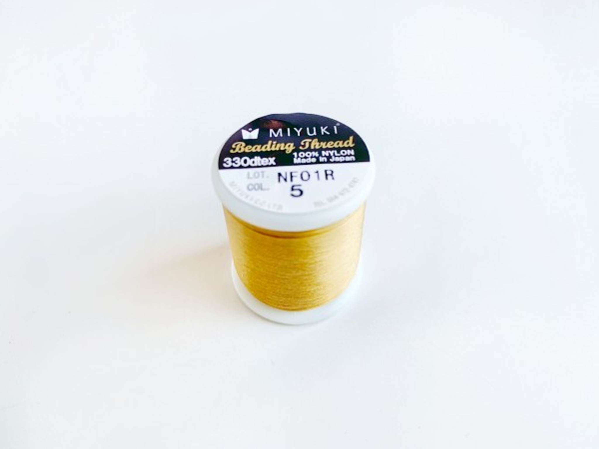 Miyuki Nylon Beading Thread, 50m in Gold | Michaels