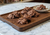 sugar free coconut haystacks on wood serving tray