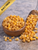 Golden caramel and cream cheddar popcorn with crunchy texture and fresh coating