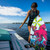 Phase 5 Diamond Luv Wakesurf Board 2023 - Woman standing on boat platform showing off back of board