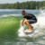 Hyperlite Automatic Wakesurf Board - Pro rider shooting down the wake
