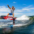 Pro rider gliding the water on a Phase 5 Gadget Wake Board with Super Nova Foil Pro rider gliding the water on a Phase 5 Gadget Wake Board with Super Nova Foil