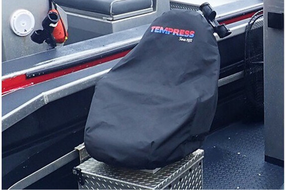 Tempress black seat cover protecting pontoon boat helm chair