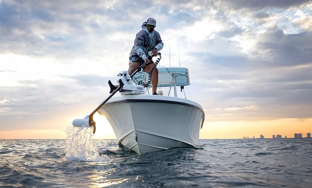 Man pulling Riptide Terrova out of the water