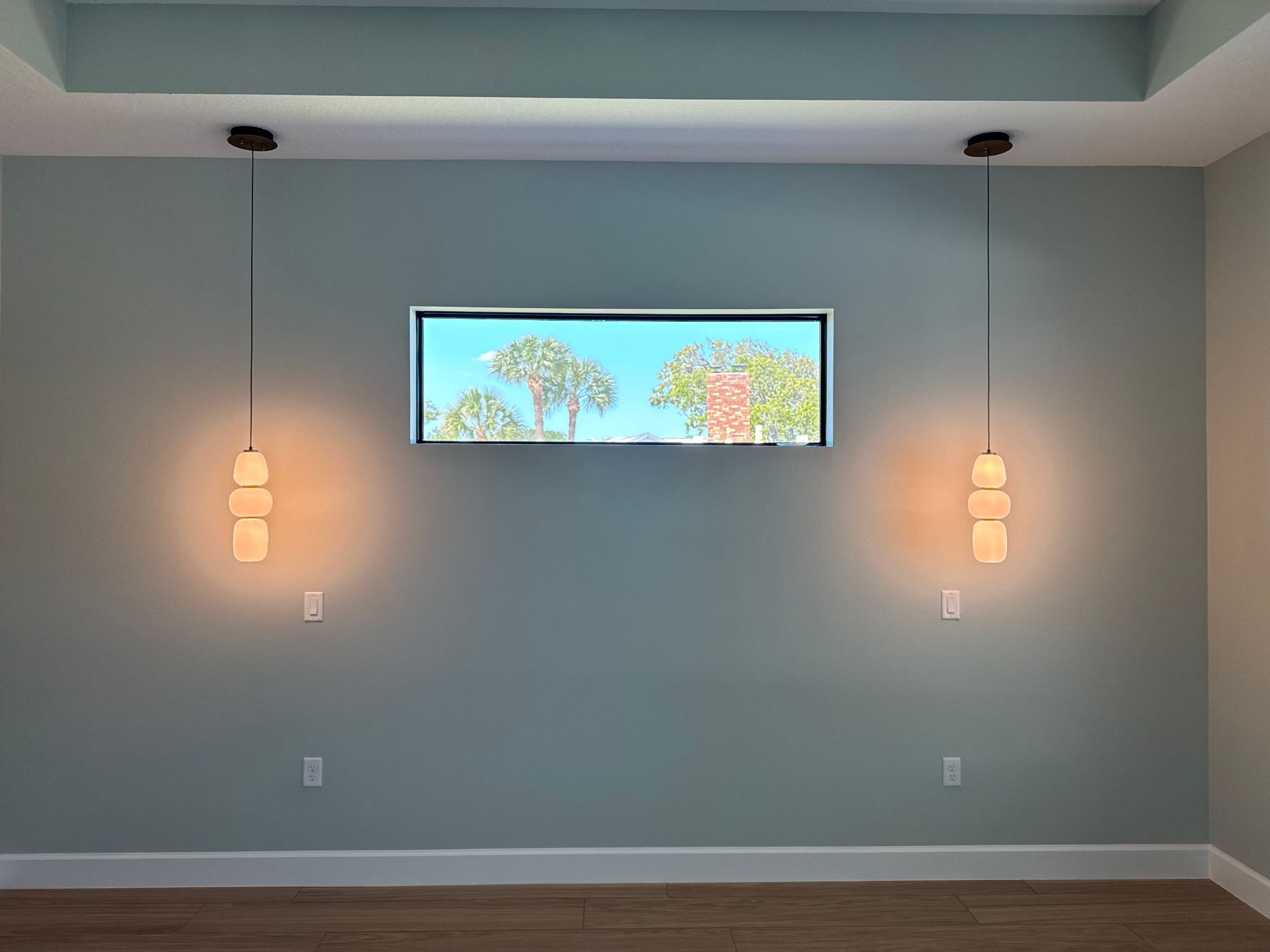 hanging sconces in an empty room