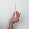 98 millimeter pre rolled cones natural brown 800 cones per case hands holding