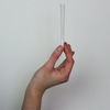 109 millimeter pre rolled cones refined white 800 cones per case hands holding