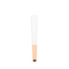upright white color tipped cone with a smooth white top and a light orange filter at the base