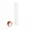 glass pre roll tubes with an open threaded neck beside a rosewood cap showing a white inner liner