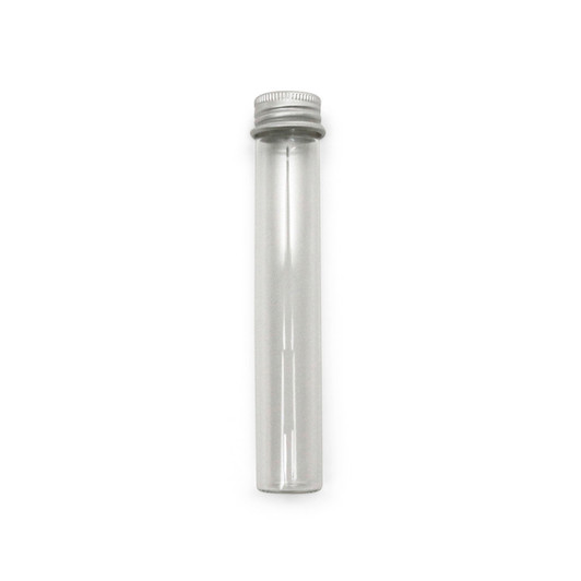 empty clear glass pre roll tube with a ridged silver aluminum screw cap on a white background