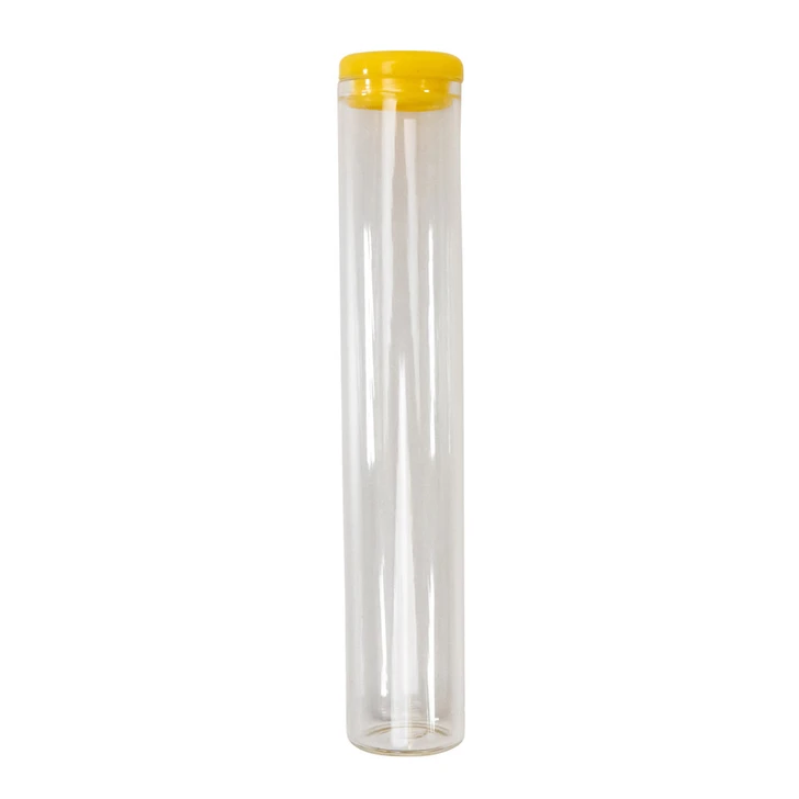 upright glass pre roll tubes with a yellow silicone cap on top