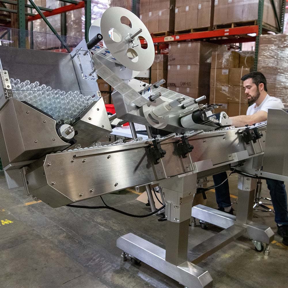 a closeup of joint tube labeling process