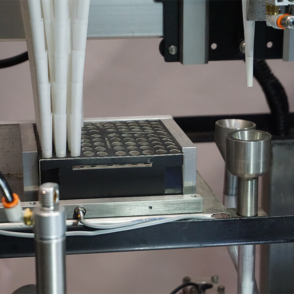 3columnbanner.jpg automated pre-roll machine up close cones