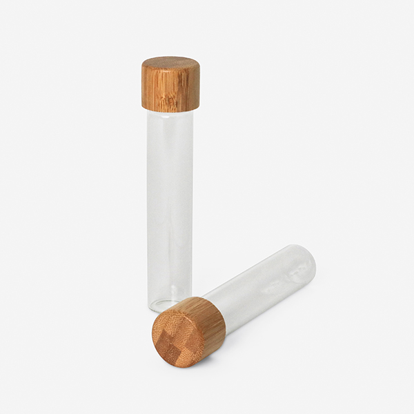 silver-cap-glass-pre-roll-tube-labeled-premium-packaging-600px.jpg