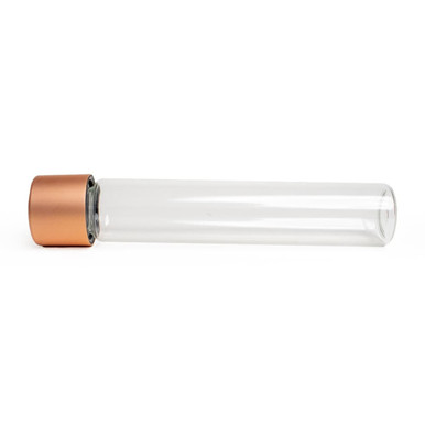 glass pre roll tubes lying flat with a rose gold cap on the left and a clear straight body