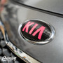 Close Up of Carbon Fiber with Gloss  Pink Kia Logo for 2014-2016 Kia Forte Hatch