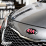 Front End Shot of Carbon Fiber with Gloss  Pink Kia Logo for 2014-2016 Kia Forte Hatch