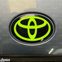GLOSS BLACK BACKGROUND WITH FLUORESCENT YELLOW LOGO OVERLAY