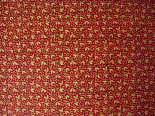 TAN LEAVES AND VINES ON RED FABRIC - 8247-008
