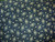 TAN LEAVES, STARS AND DOT CLUSTERS ON BLUE FABRIC - GERA-00573