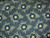 TAN STARS WITH SCALLOPS, FERN-LIKE LEAVES AND DOTS ON BLUE FABRIC - GERA-00572