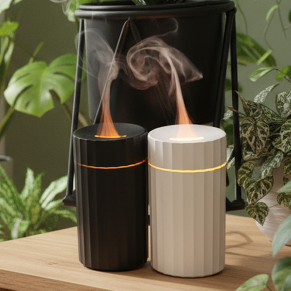 Candyl Mini is a compact essential oil diffuser with a realistic flame effect, 7-color mood lighting, auto shutoff, and USB-C power. Fits perfectly in car cup holders.