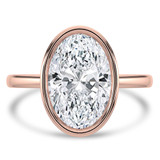 Oval Diamond Bezel Set Solitaire Engagement Ring in Rose Gold (MVSLG1456-R) Oval Diamond Bezel Set Solitaire Engagement Ring in Rose Gold (MVSLG1456-R)