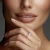 Oval Diamond Three-Stone Engagement Ring in Rose Gold with Accents (MVSX1053-R)