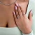 Round Lab Created Diamond Twisted Solitaire with Accents Engagement Ring in White Gold (MVSLG1292-W)
