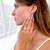 Cushion Diamond Vintage Three-Stone Halo Engagement Ring in White Gold with Accents