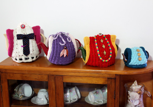 CMPATK005 Craft Moods knitting pattern for Roll-up Your Sleeves Tea Cosy with 5 pattern variations in 4 sizes