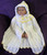 Image of finished Carrying Cape from Craft Moods book BK35 Pattern 5 Hooded Carrying Cape with a circular bodice.