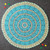 Image of finished shawl from Craft Moods book BK55 Cosy Rugs to crochet for your Bub Pattern 1, Pineapple shawl in the round.